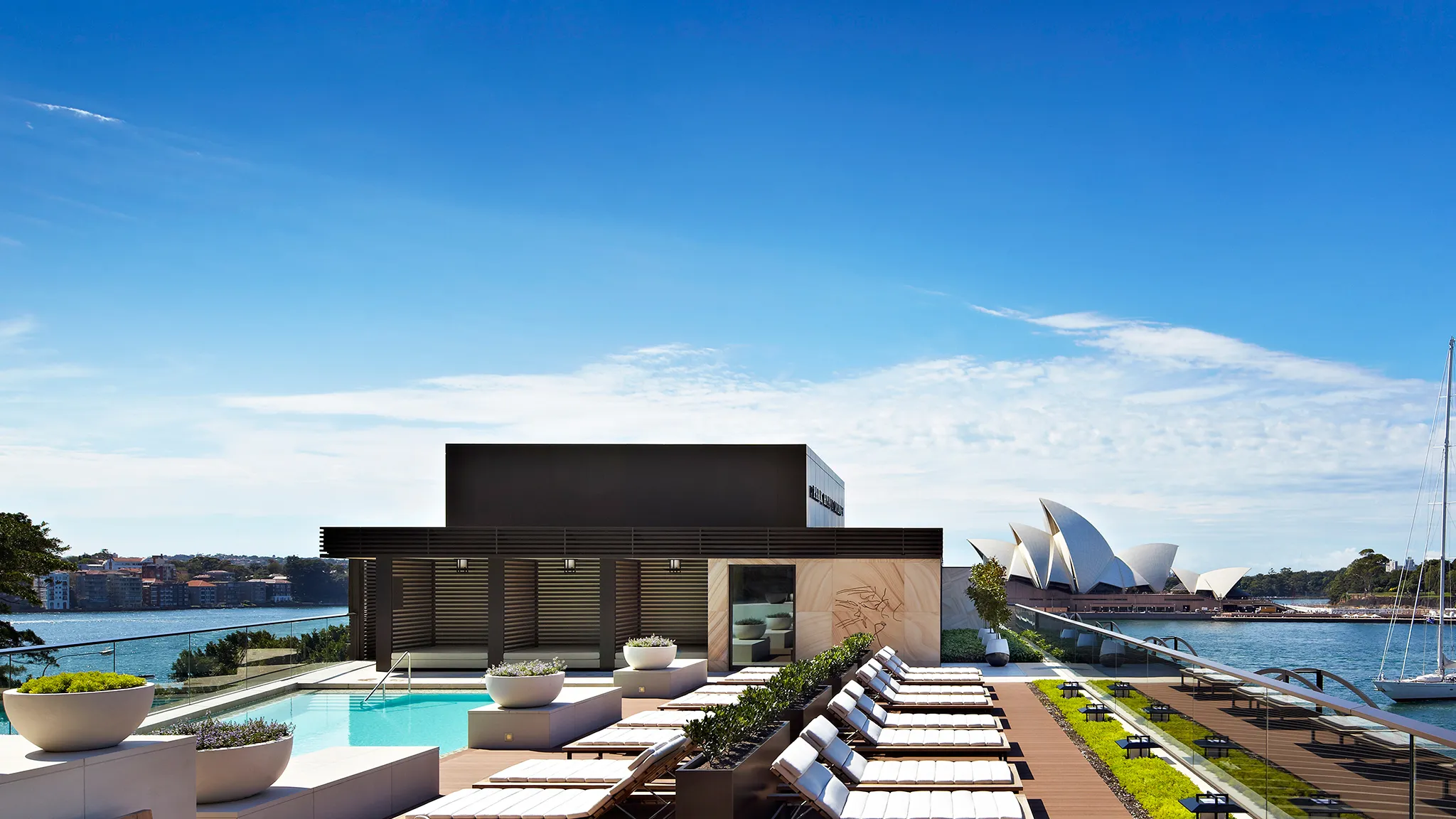 The rooftop pool looking toward the Sydney Opera House.